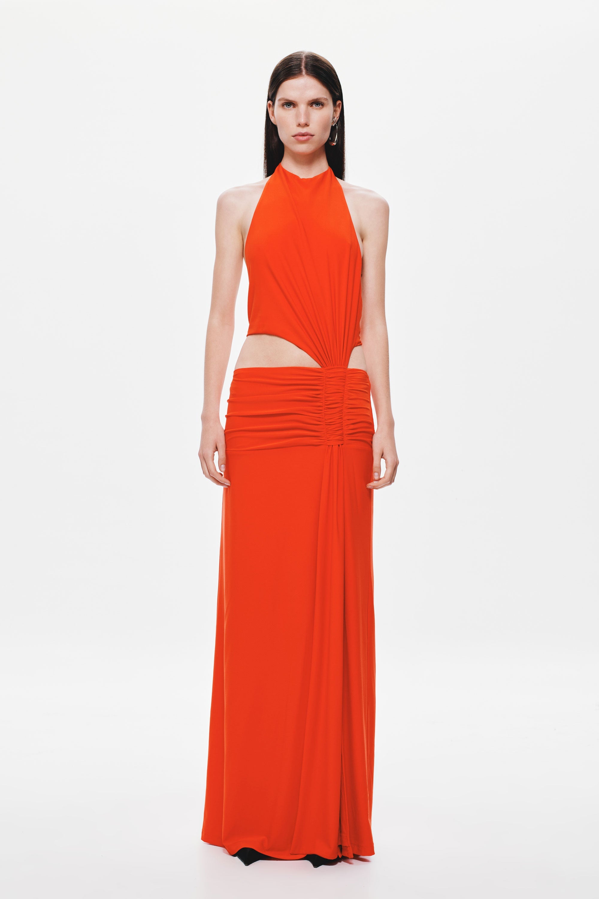 Chili red sleeveless halter jersey maxi dress with ruched waist and draped bodice panels