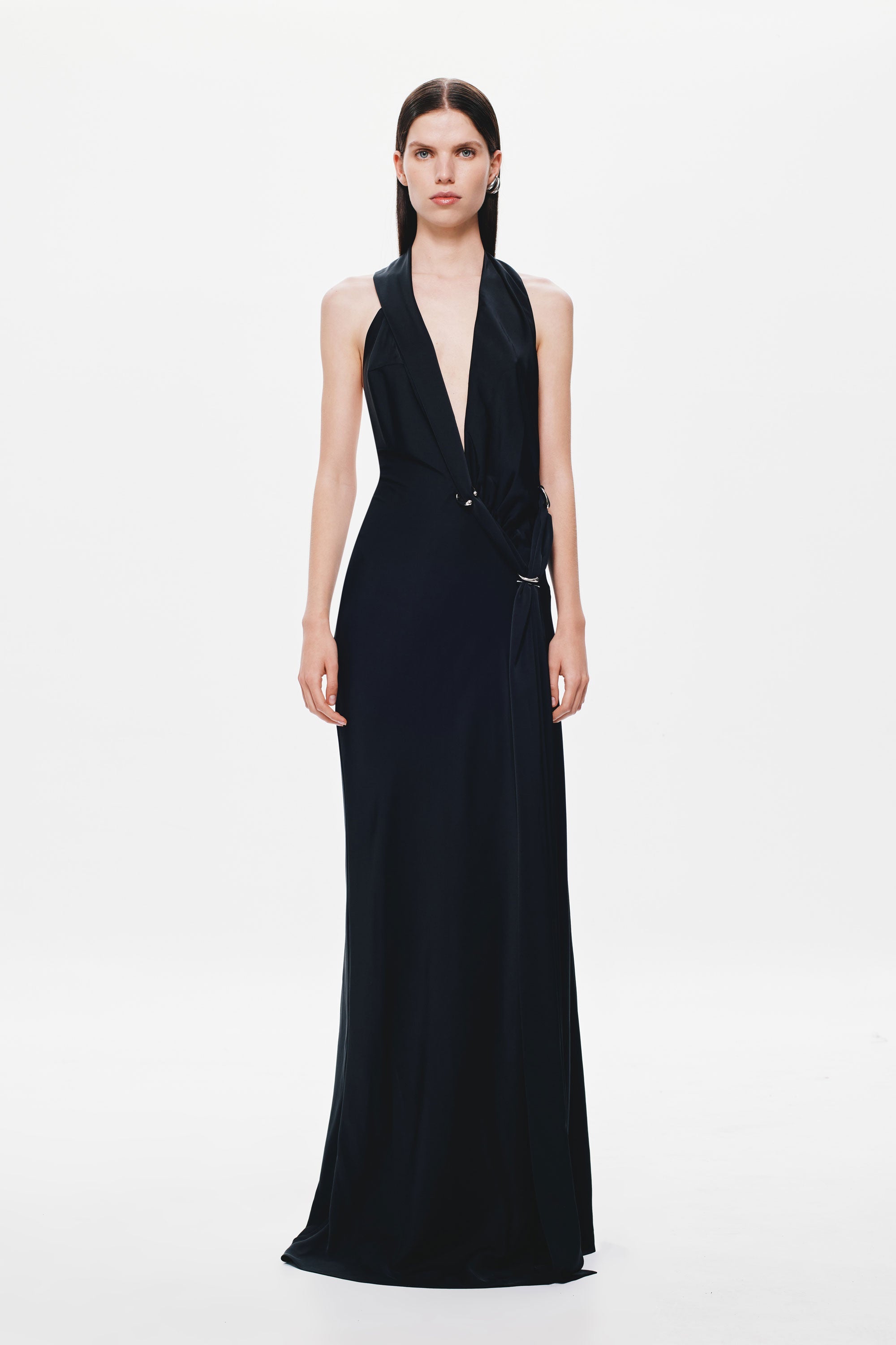 Black satin halter dress with deep V neckline and slim waist drape