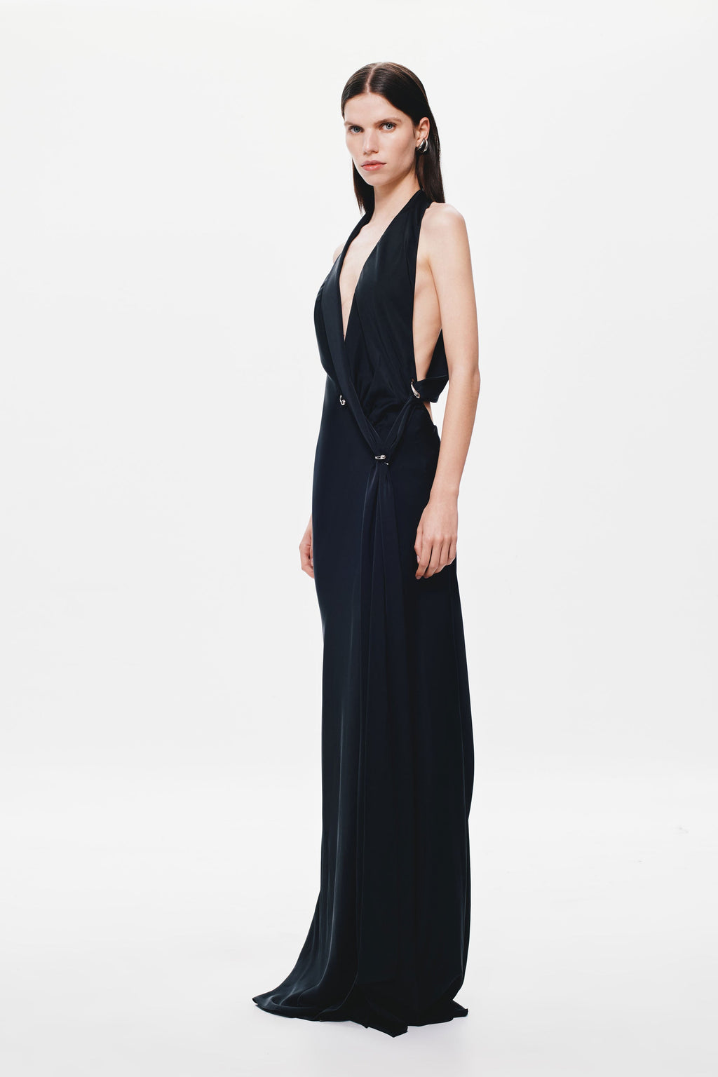 Black satin maxi dress with deep V halter neckline and leg-slit hem