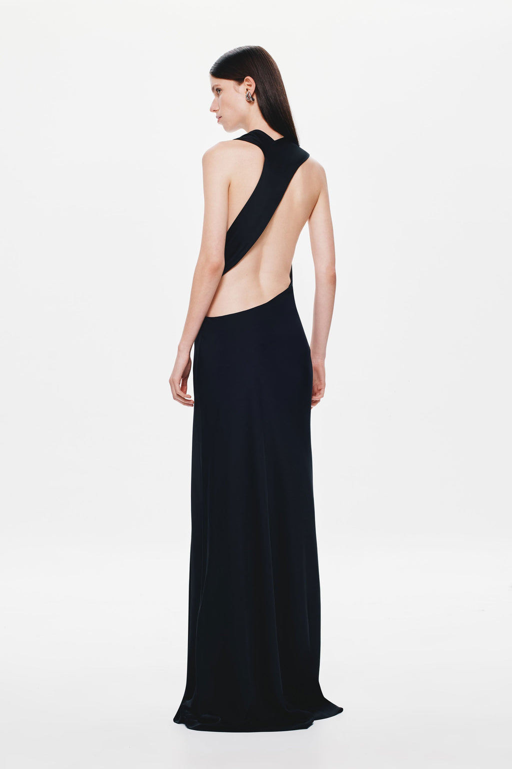 Black satin maxi dress with open back and low halter strap