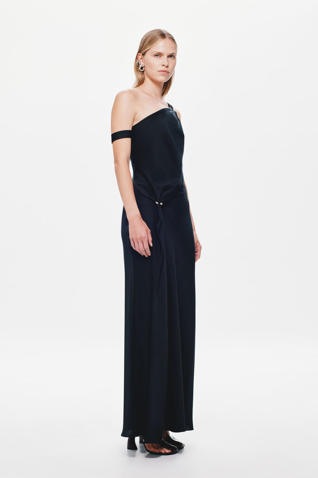 Black satin off-shoulder maxi dress with diagonal drape