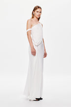 Ivory satin slip dress on model, one-shoulder style with draped front detail