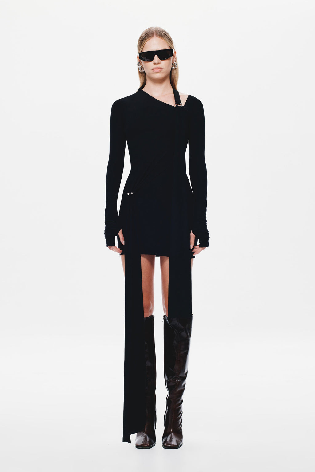 Black jersey mini dress, long sleeves with asymmetrical side panel at hem