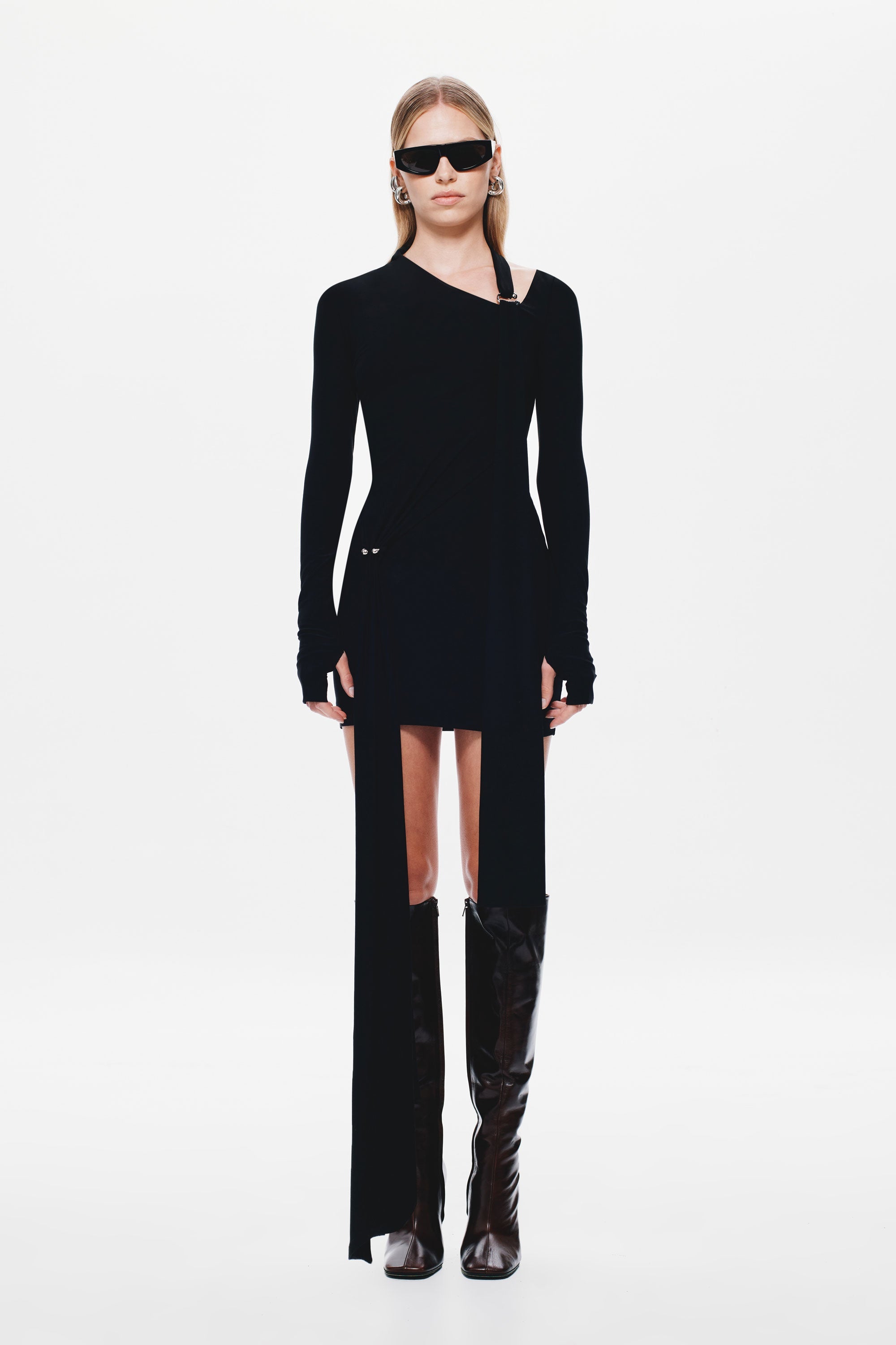 Black jersey mini dress, long sleeves with asymmetrical side panel at hem