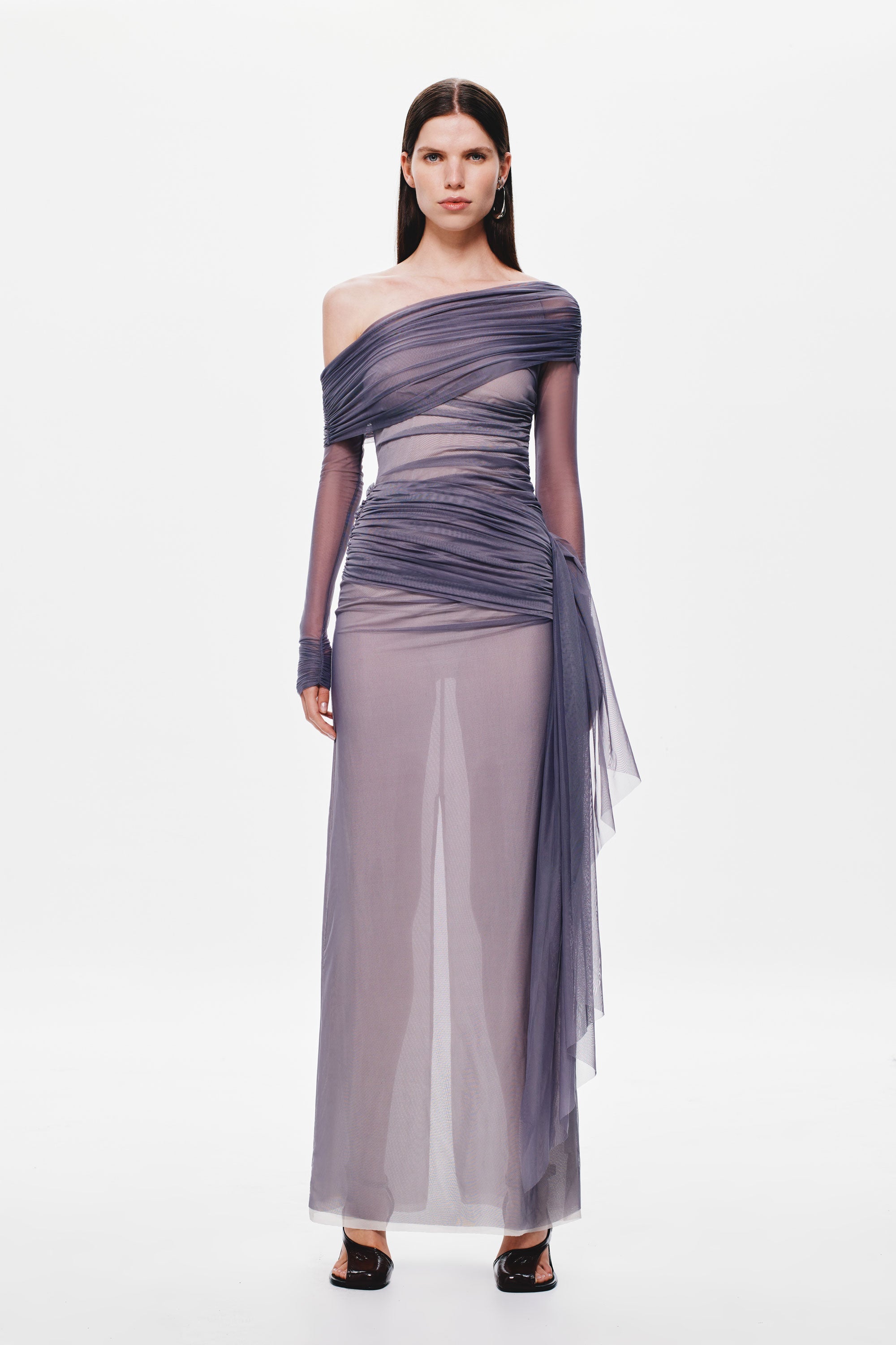 Off-shoulder ruched mesh dress with draped neckline, column skirt, and sheer side-tulle panel.