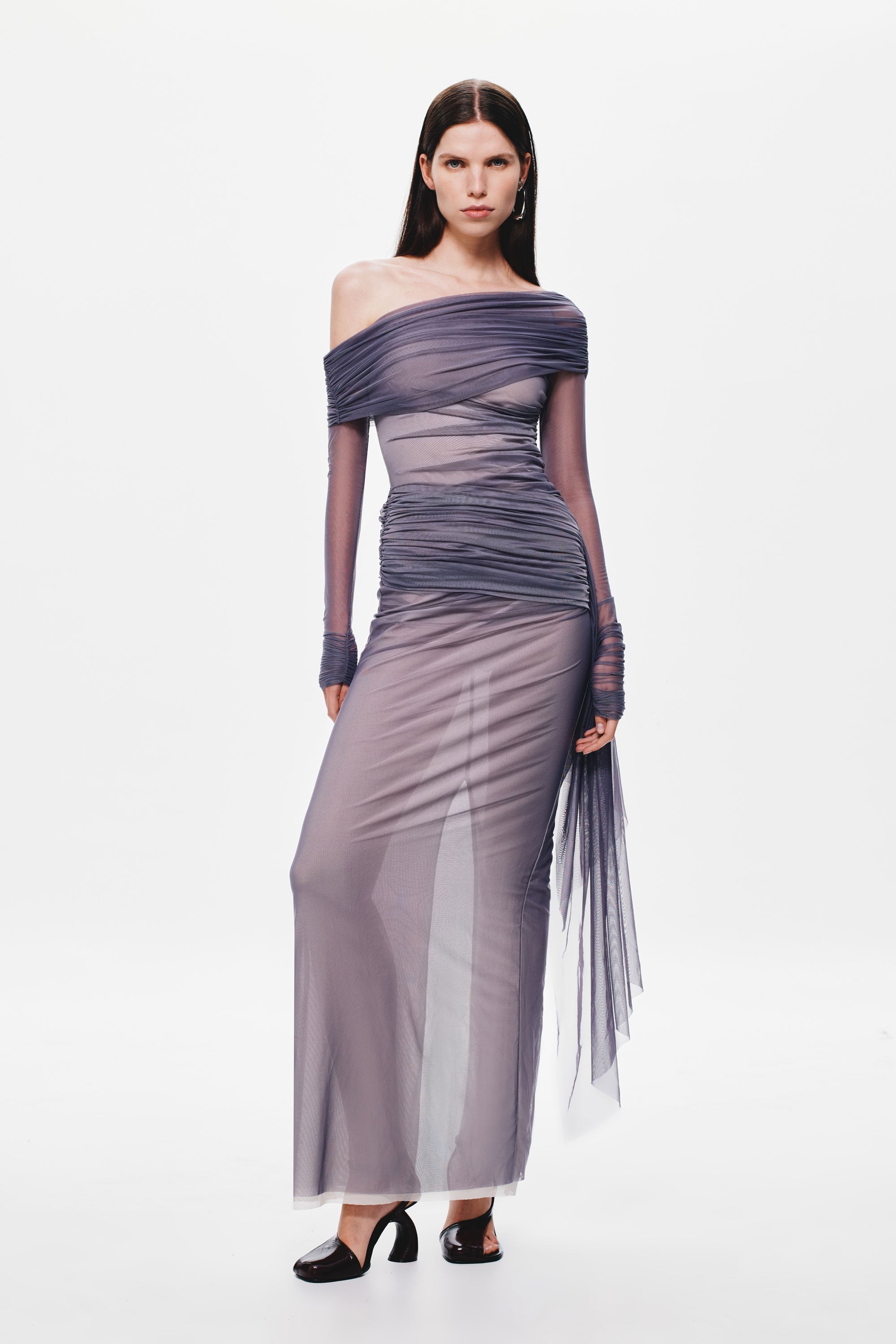 Off-shoulder mesh dress with draped ruched bodice, sheer sleeve, column skirt and tulle back.