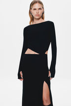 Black long-sleeve jersey maxi dress with waist cutout and high side slit detail