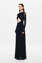 Black long-sleeve maxi dress with sheer back sleeves and diamond cutout