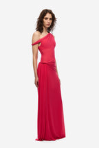 Bright rose one-shoulder maxi dress with twisted front drape and flowing skirt