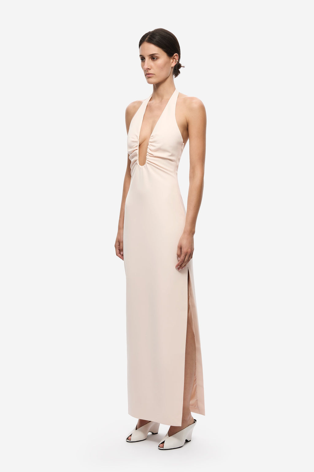 Soft pink sleeveless crepe maxi dress with deep front halter neckline and slit