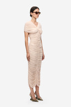 Soft pink ruched midi jersey dress with twisted neckline and gathered sides