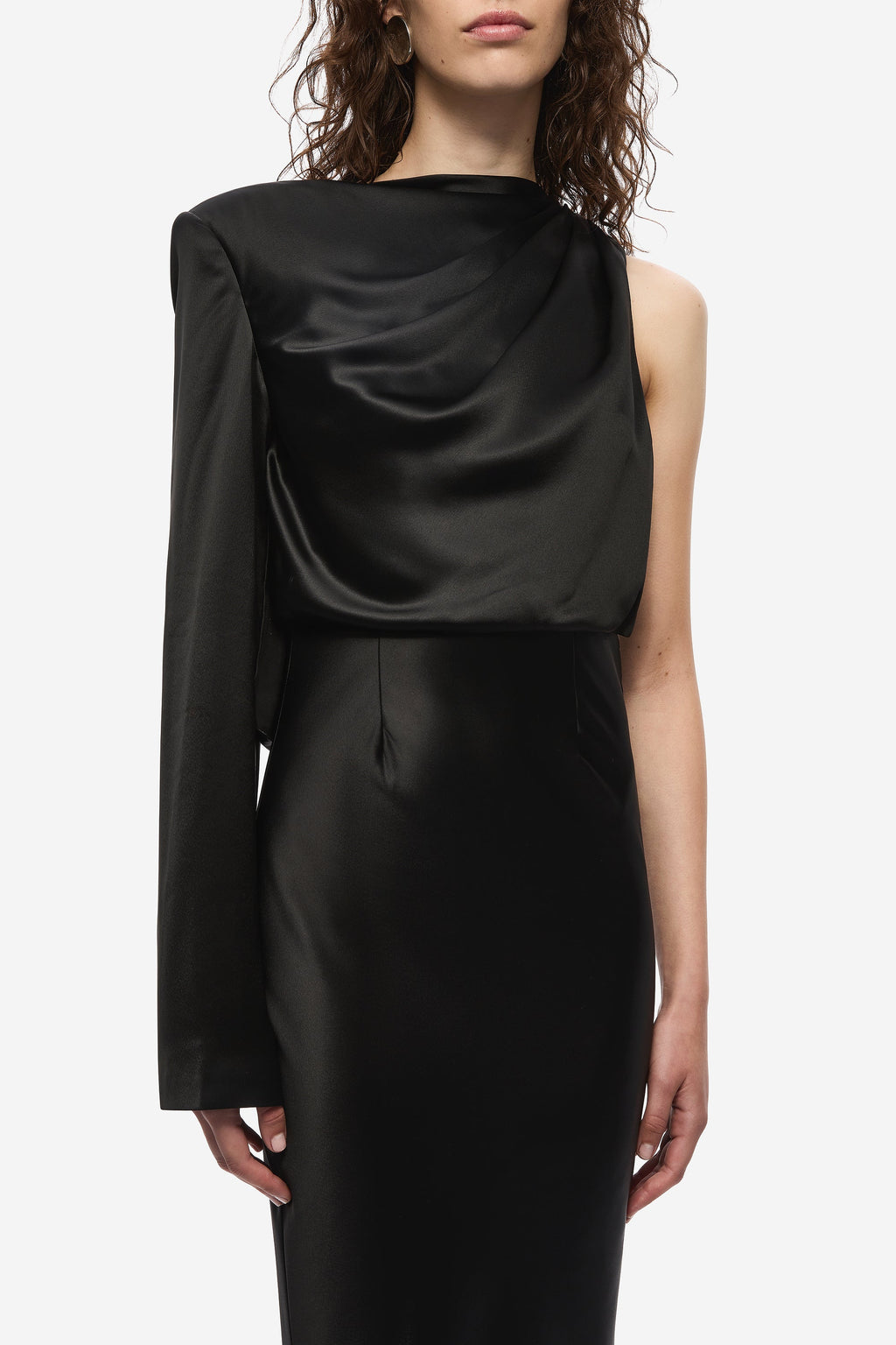 Black satin midi dress close-up: draped cowl neckline on sleeveless bodice