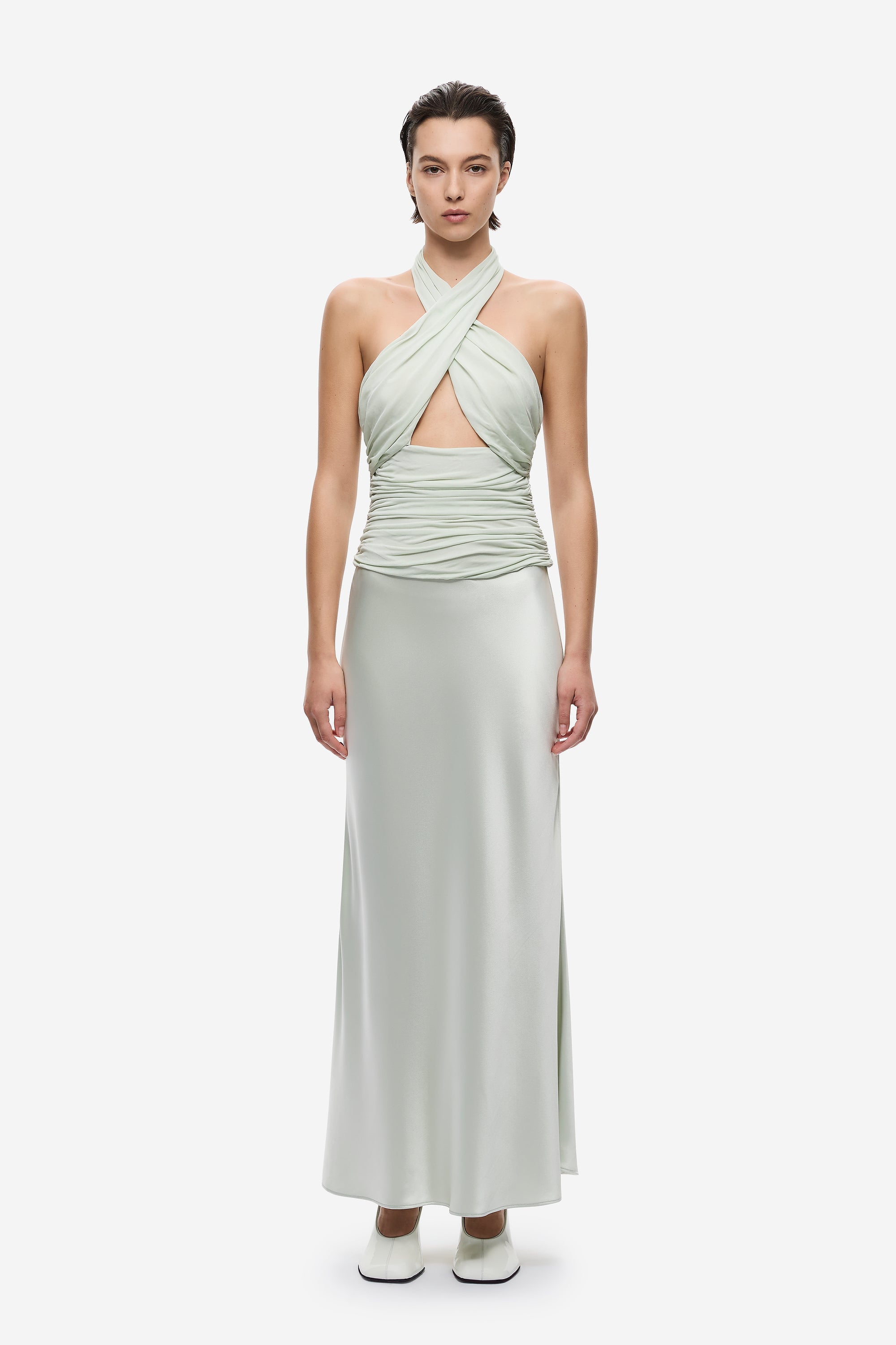 Pistachio midi dress with halter twist drape and ruched waist detail