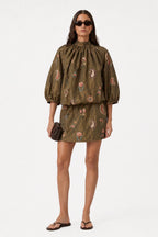 Olive mini dress with high neck ruffle, long puff sleeves, and floral print