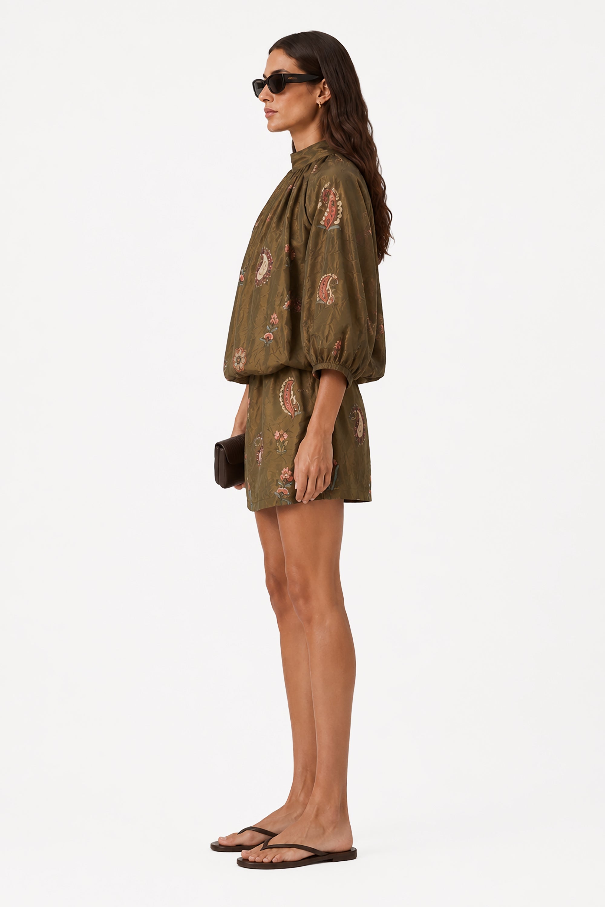 Olive mini dress with high neck ruffle and long puff sleeves, side view, floral print