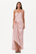 Blush pink maxi dress with rosette drape, spaghetti straps, and asymmetrical hem