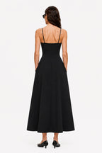Black midi crepe dress with low-back straps and flared skirt, back view