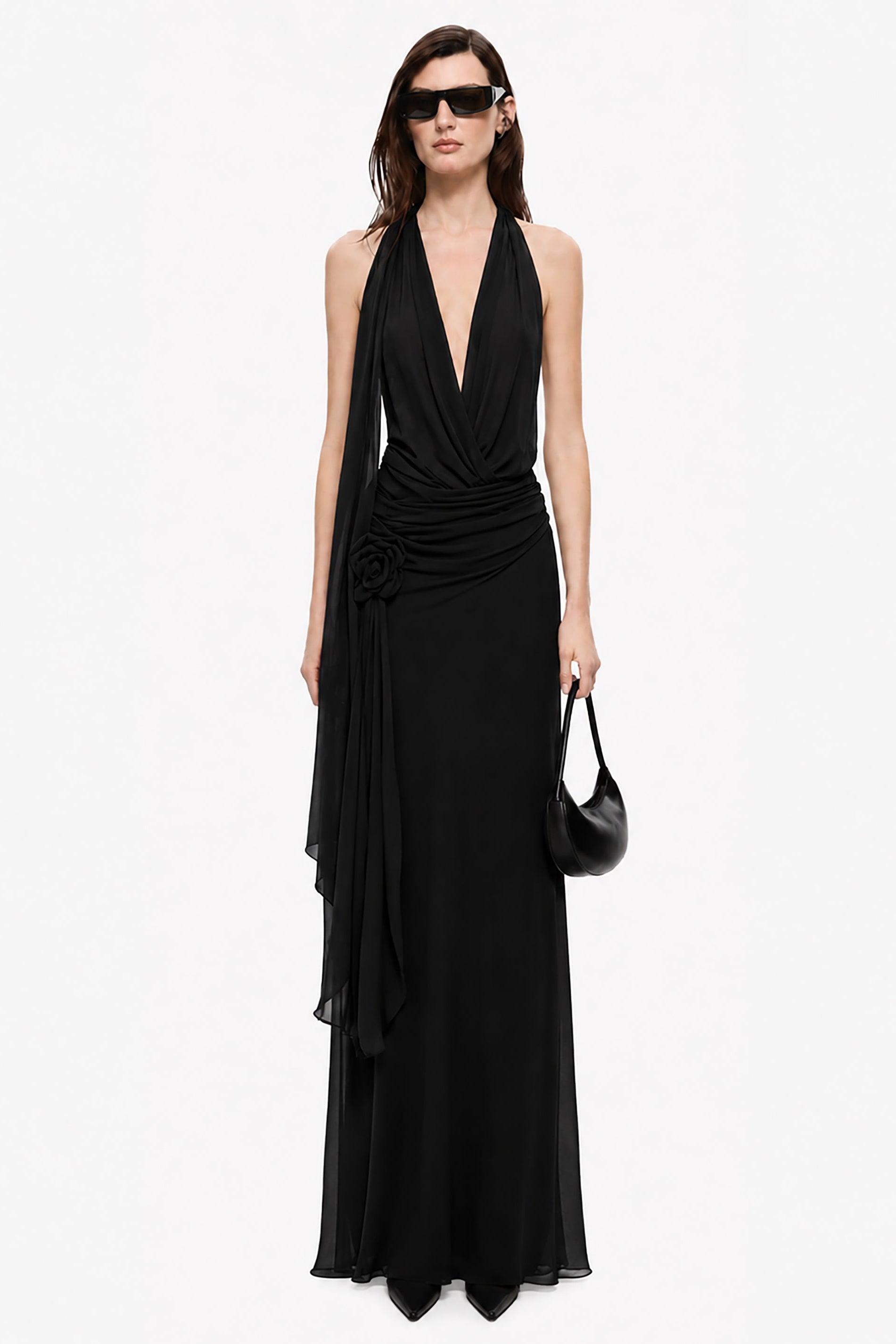 Black sleeveless maxi dress with deep V halter neckline and ruched drape waist