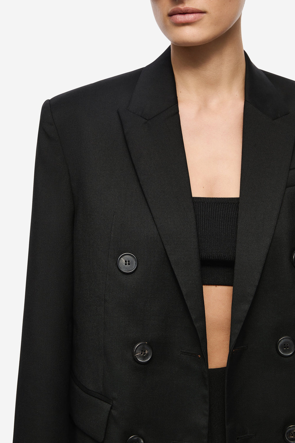 THE DREW black wool suiting blazer close-up, double-breasted buttons and lapels