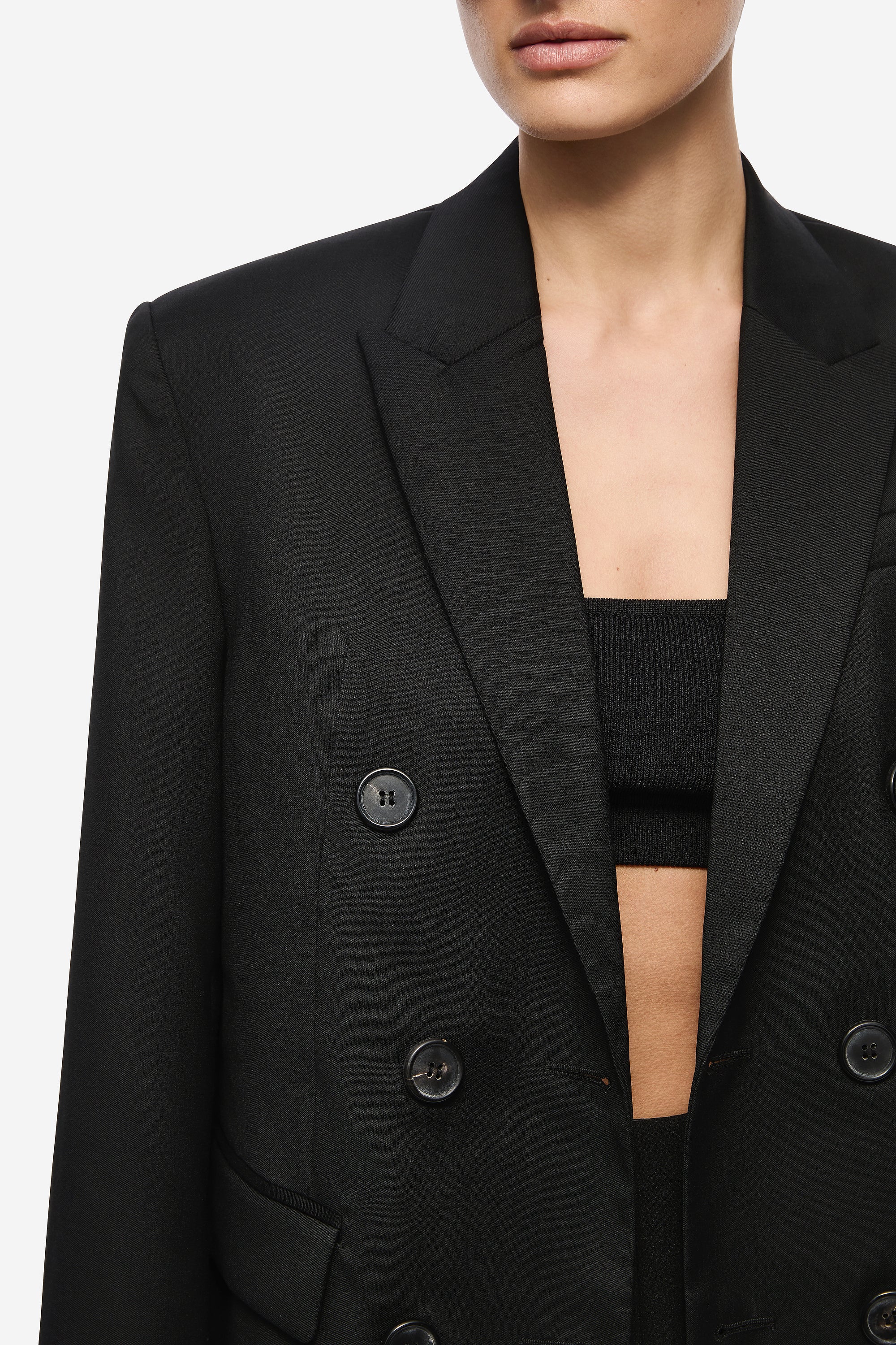 THE DREW black wool suiting blazer close-up, double-breasted buttons and lapels