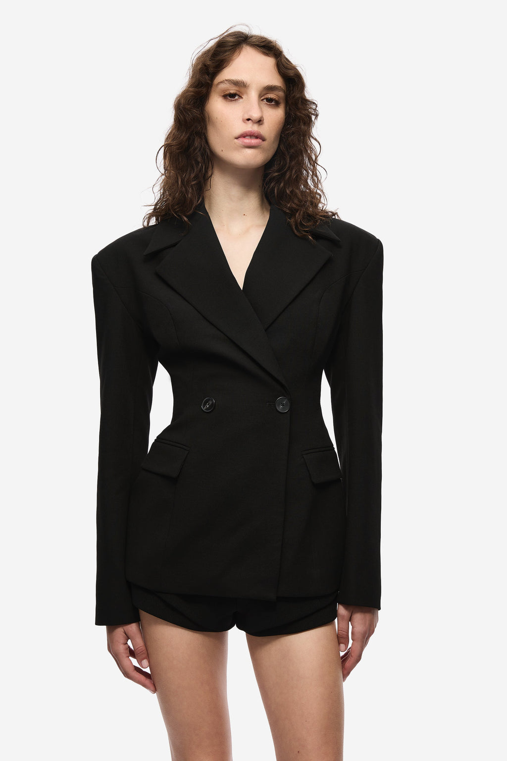 Black crepe blazer with notch lapels, double-button front, flap pockets, long sleeves