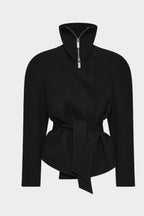 Black acetate collared jacket on mannequin: stand collar, front zip, tied belted peplum.