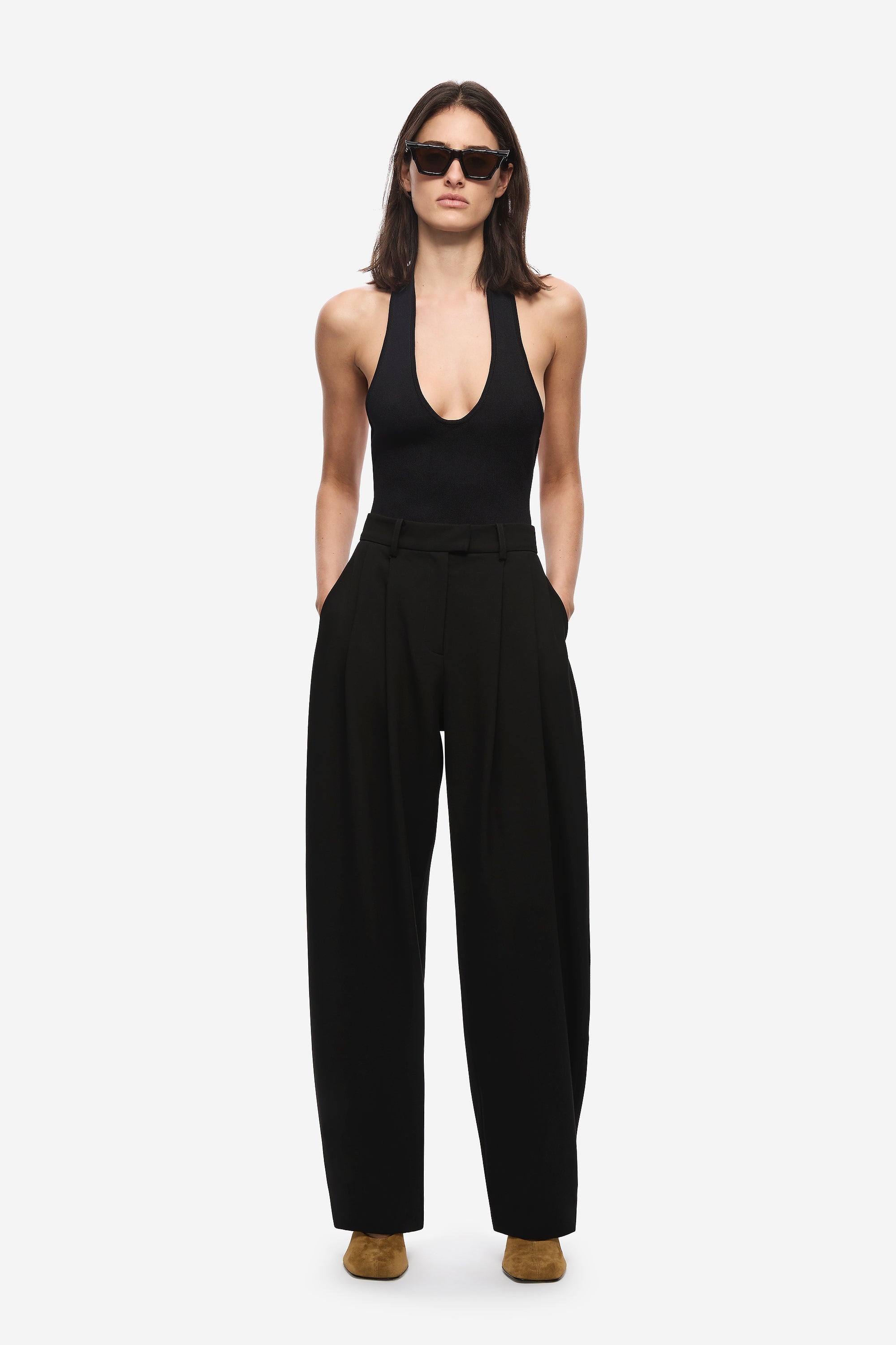 Black scuba compact knit bodysuit with deep V halter neckline, slim fit