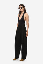 Black scuba compact knit bodysuit halter straps and deep V front, side view