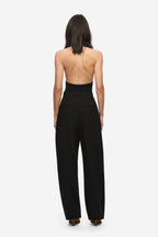 Black scuba compact knit bodysuit with scooped back and halter straps