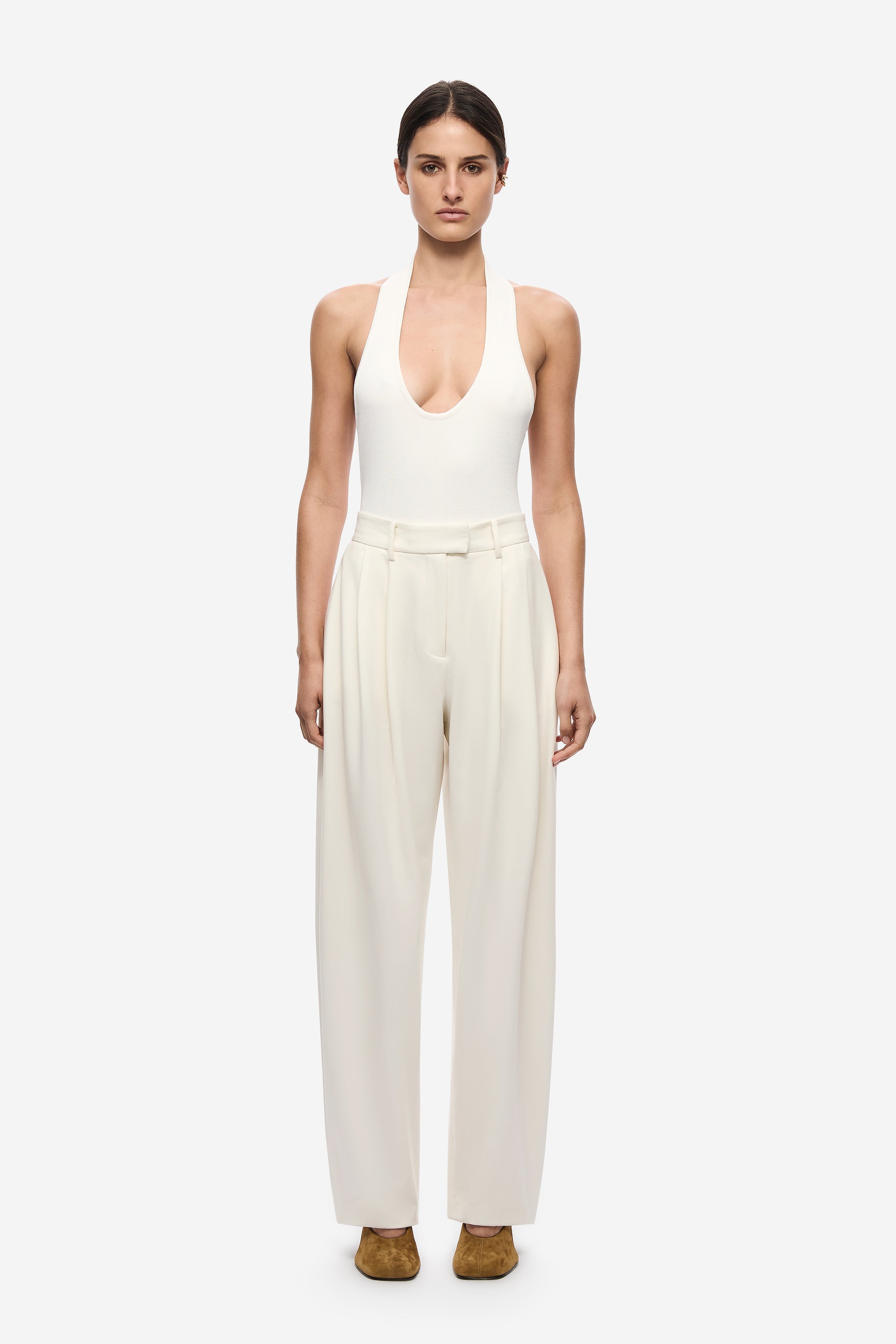 Ivory halter knit bodysuit with deep scoop neckline, sleeveless, full-length view