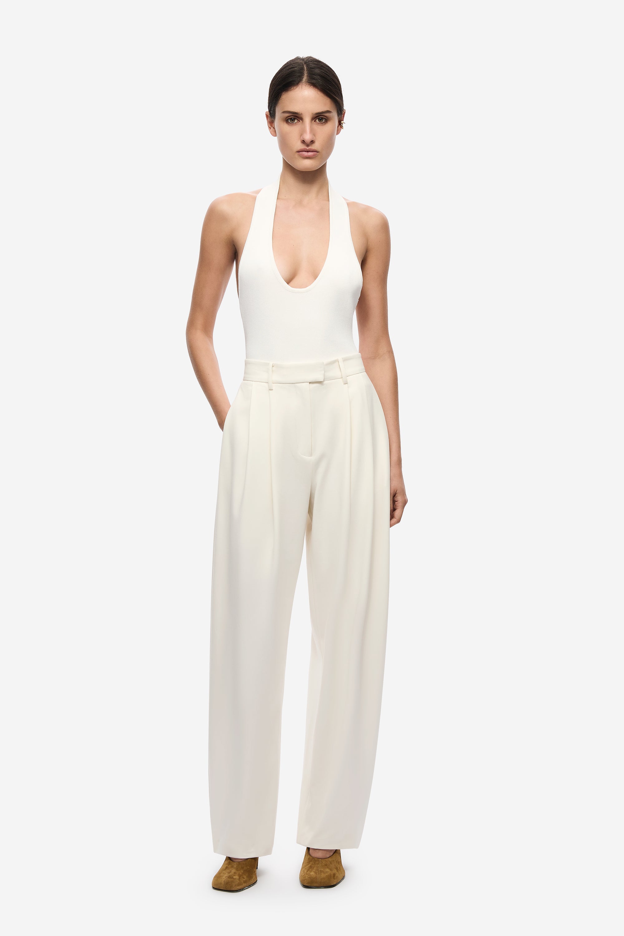 Ivory pleated barrel-leg trousers with tailored high waist and relaxed wide legs