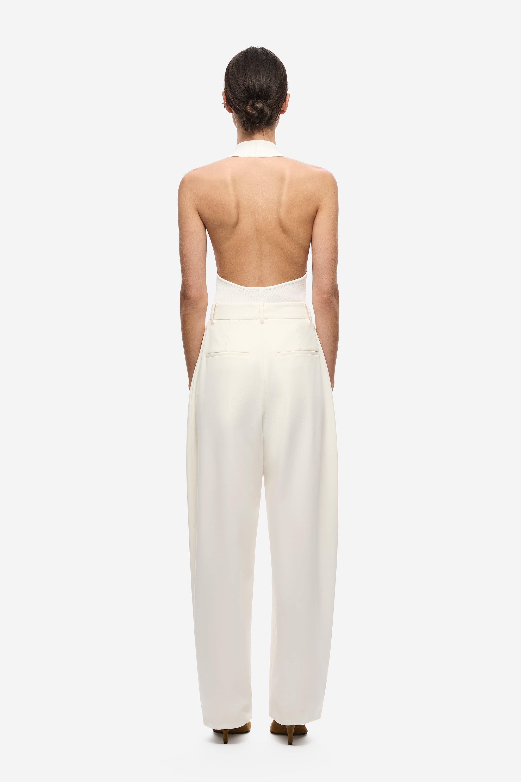 Ivory pleated barrel-leg trousers, back view with high waist and wide legs