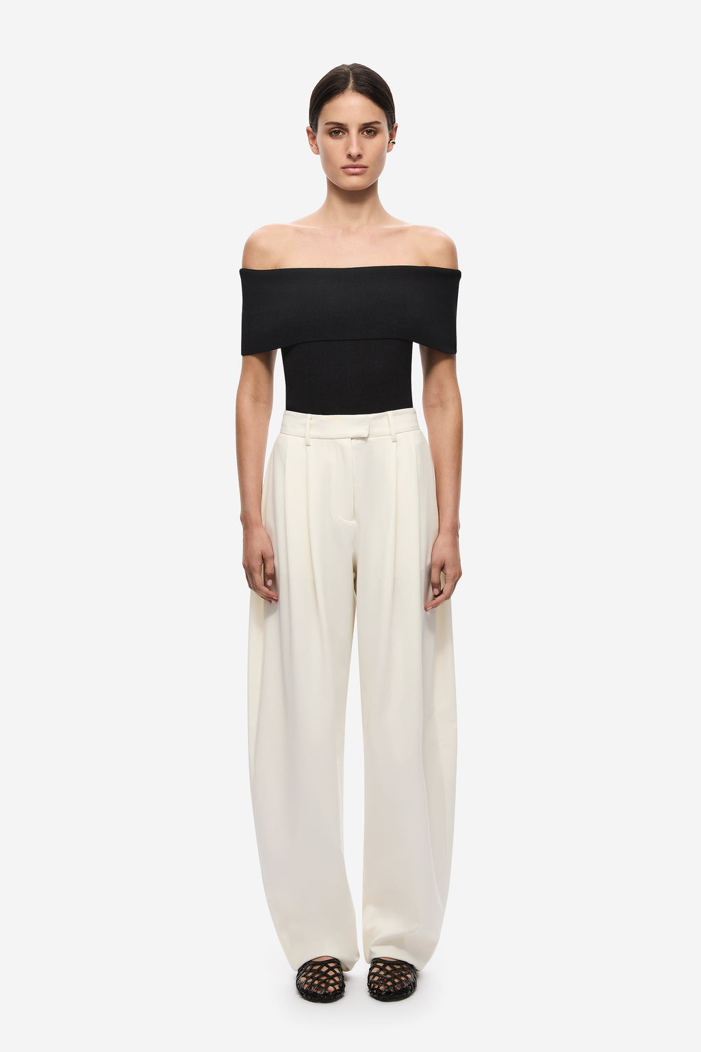 Black off-shoulder knit bodysuit with fold-over neckline, front view
