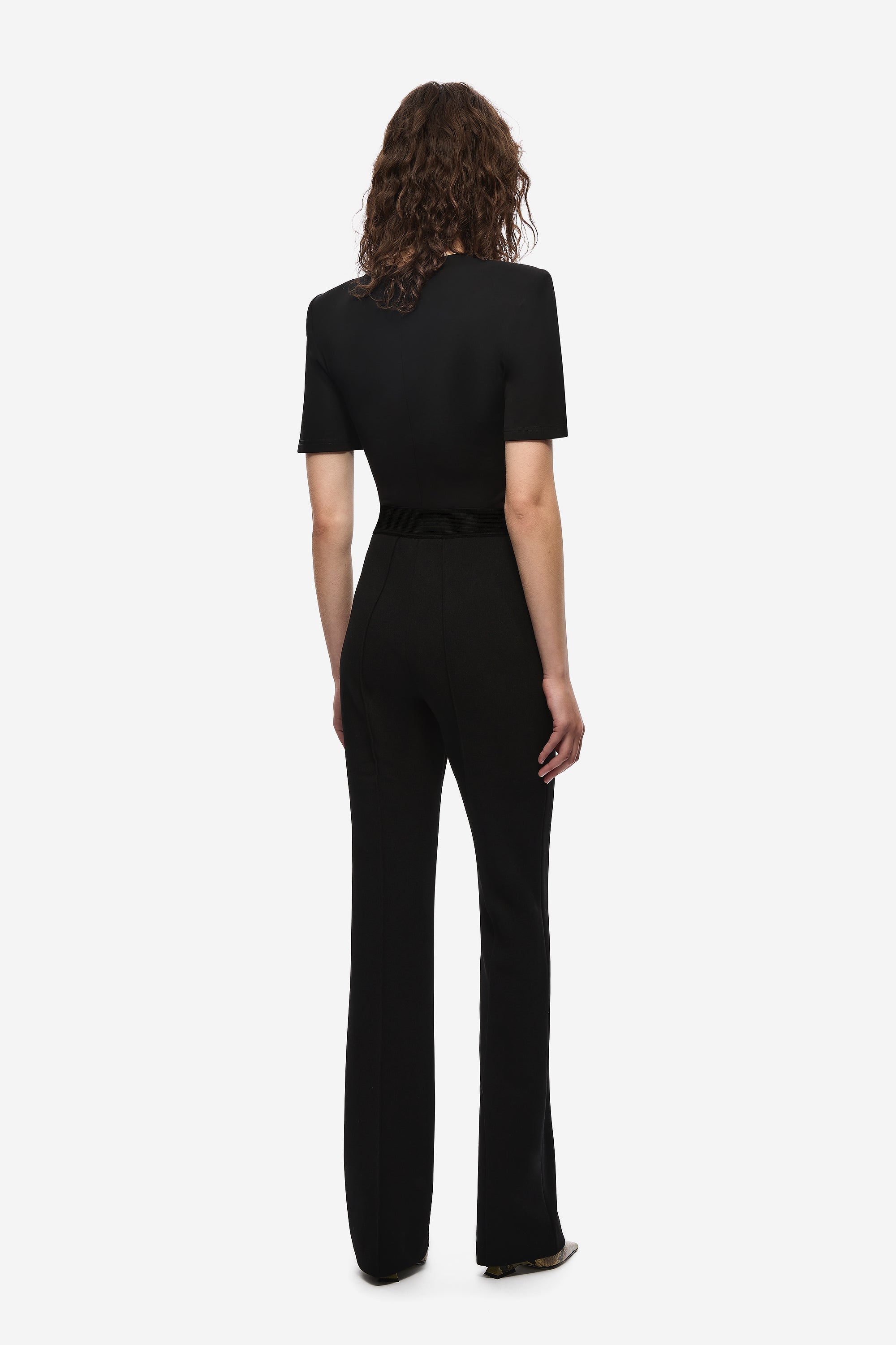 Black tailored stretch crepe trousers back view, straight wide-leg cut