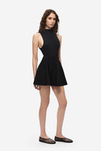 Black flared knit mini skirt with A-line hem and fitted waist