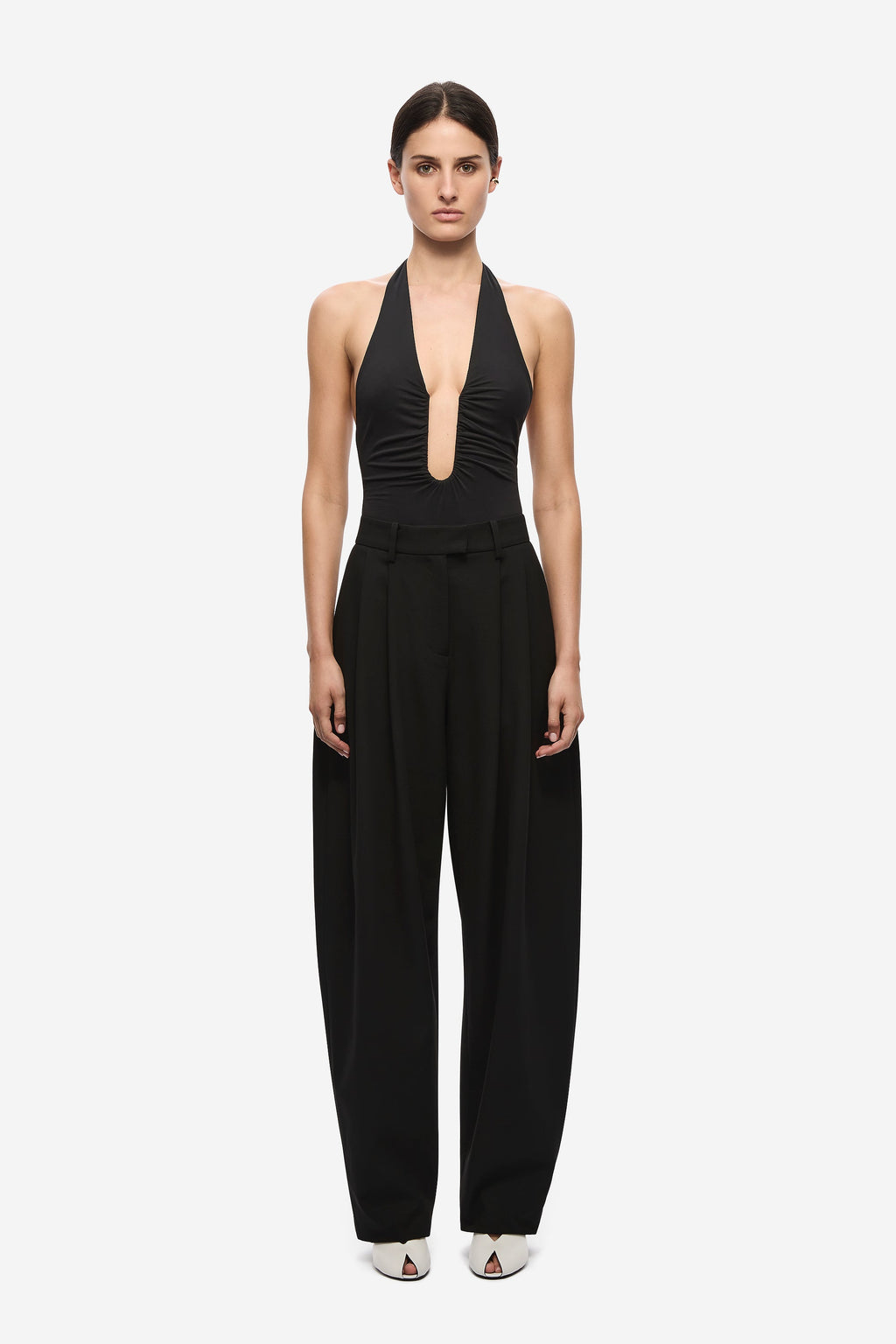 Black halter bodysuit with keyhole plunge front and attached wide-leg pants