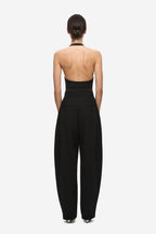Black halter bodysuit with open back and attached wide-leg pants