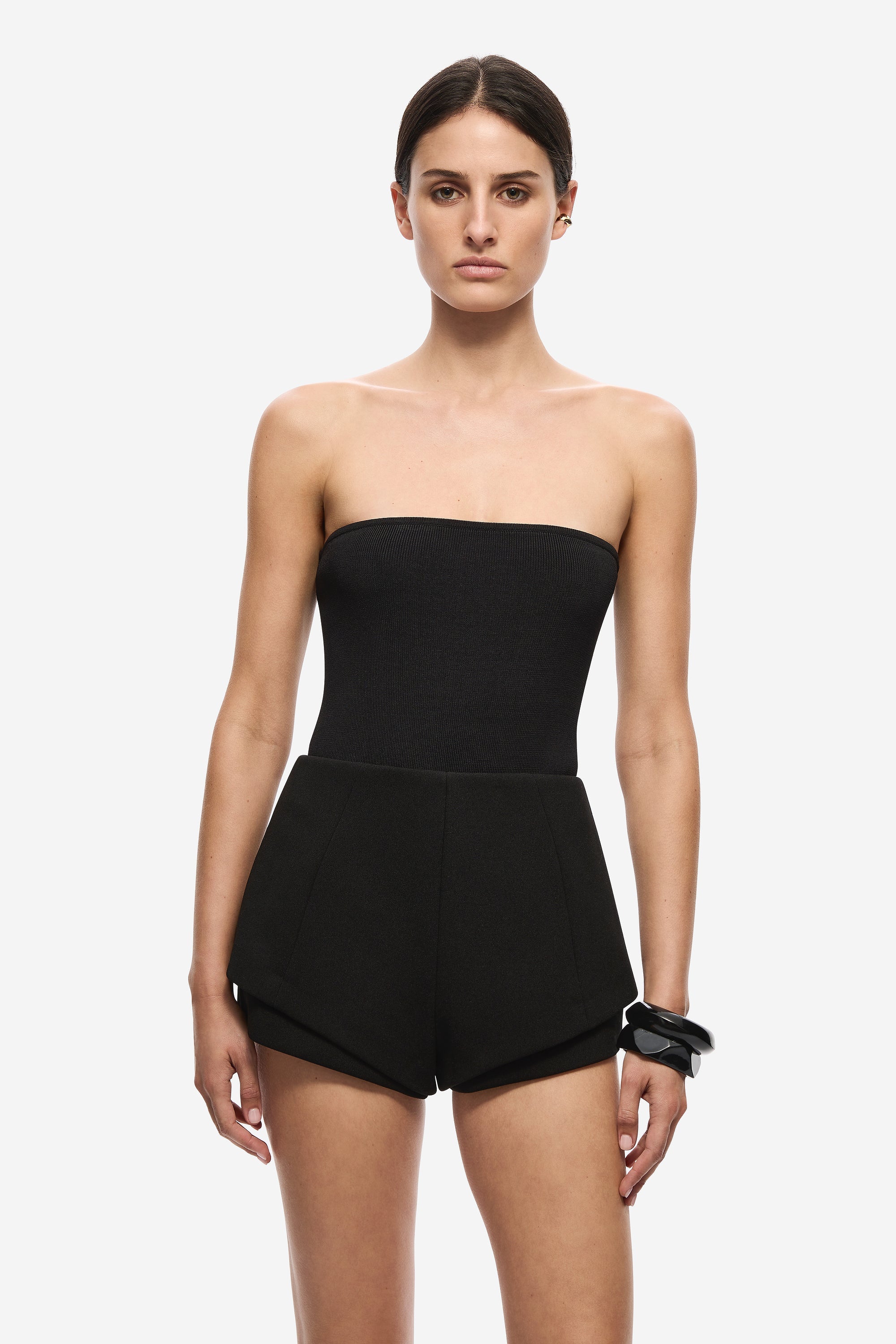 Black strapless knit bodysuit with high-waist shorts, front close-up