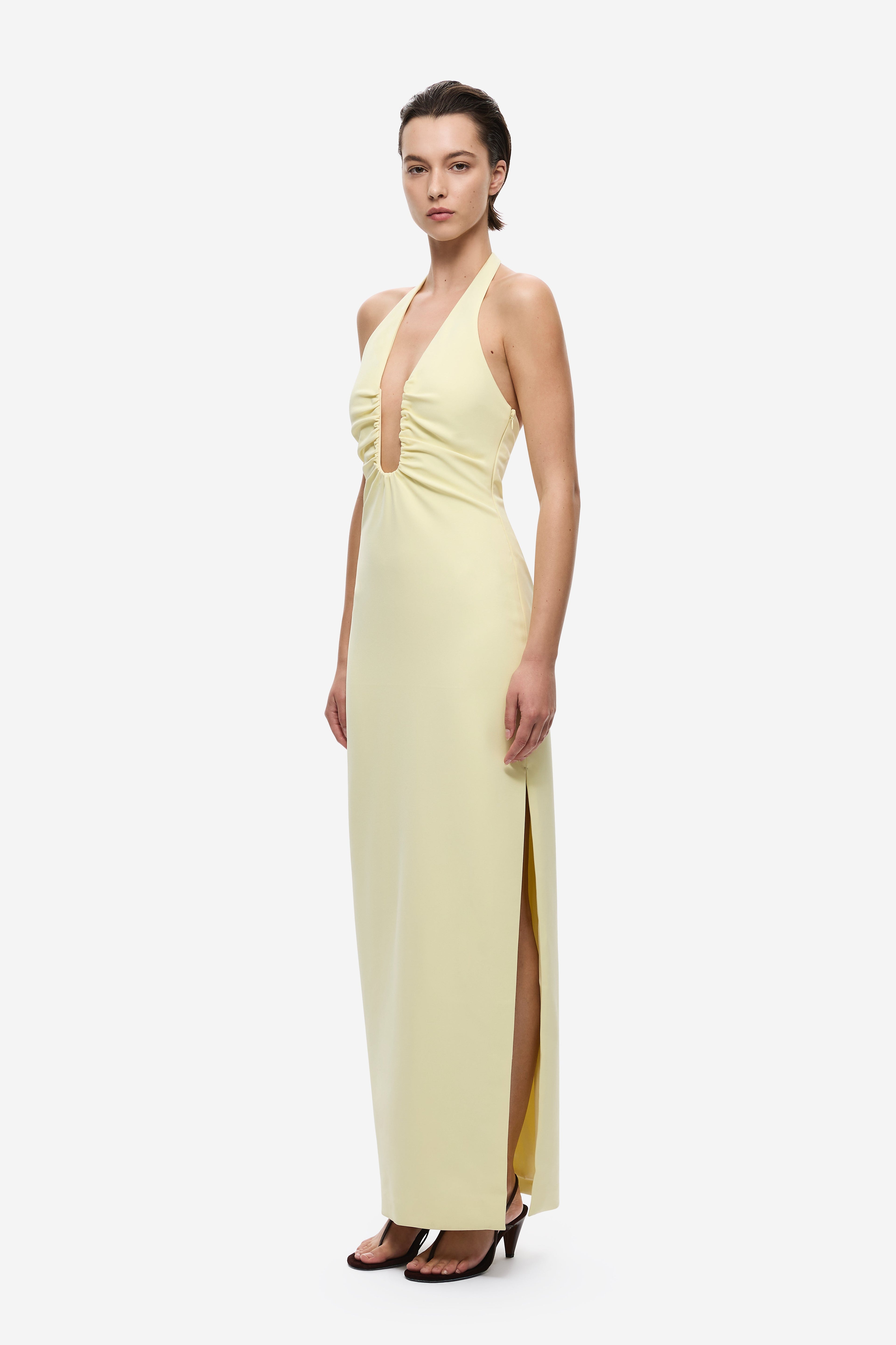 Lemon yellow halter maxi dress with side slit, deep V-neck, circular neckline cutout