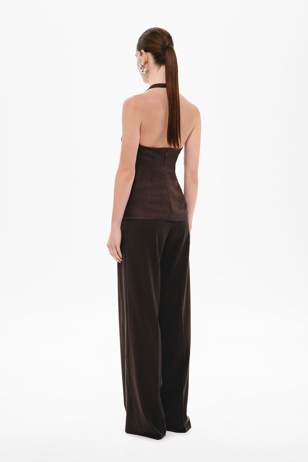 Back view of dark brown halter silk top with open back and gathered straps