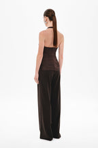 Back view of dark brown halter silk top with open back and gathered straps
