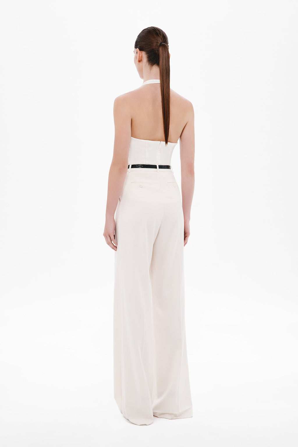 Off-white halter silk top with open back and V-shaped back neckline