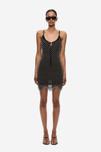 Black beaded crochet mini dress with spaghetti straps and scalloped beaded hem fringe