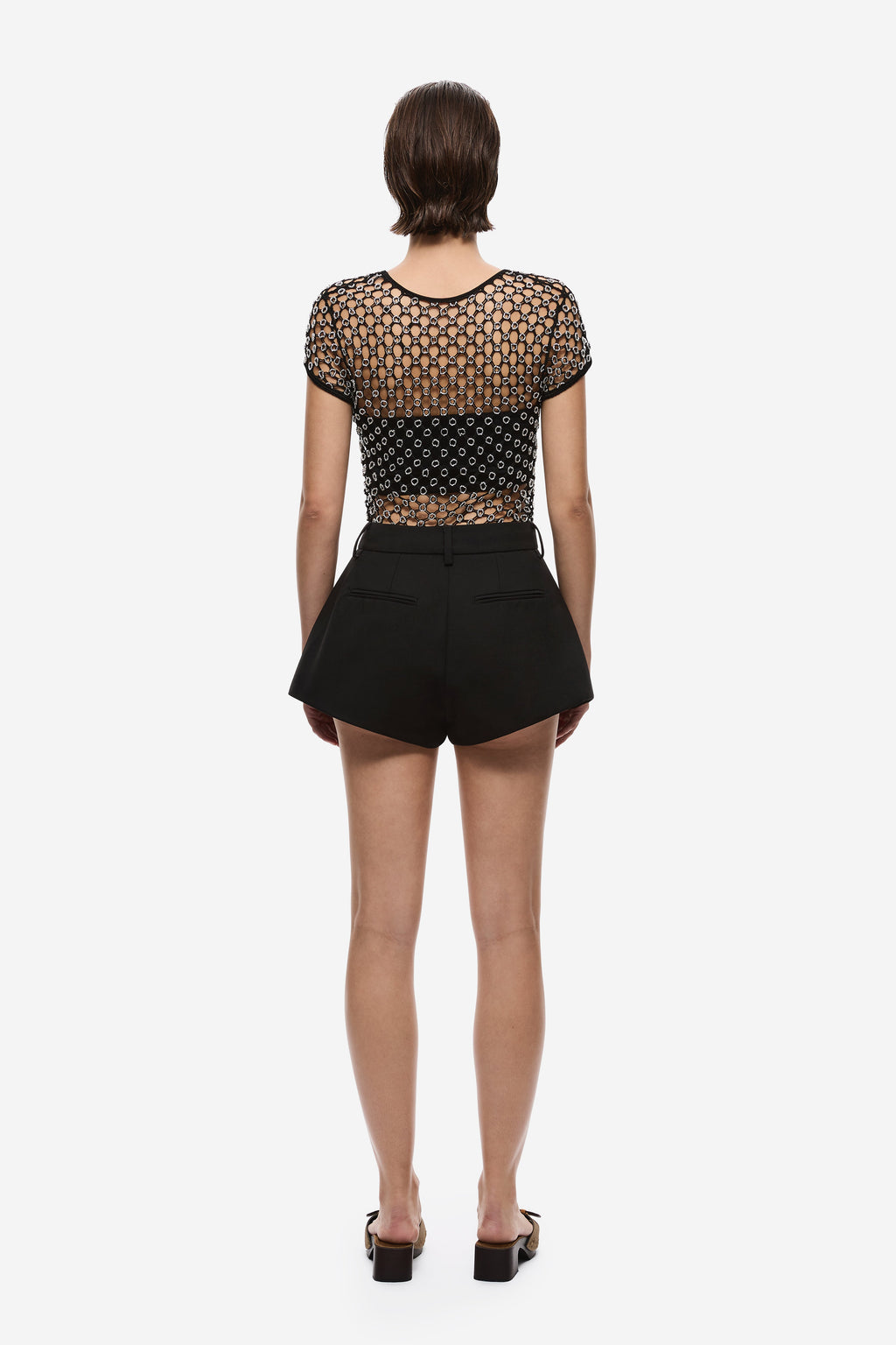 Black beaded crochet cropped tee, openwork chain pattern, short sleeves, back view.
