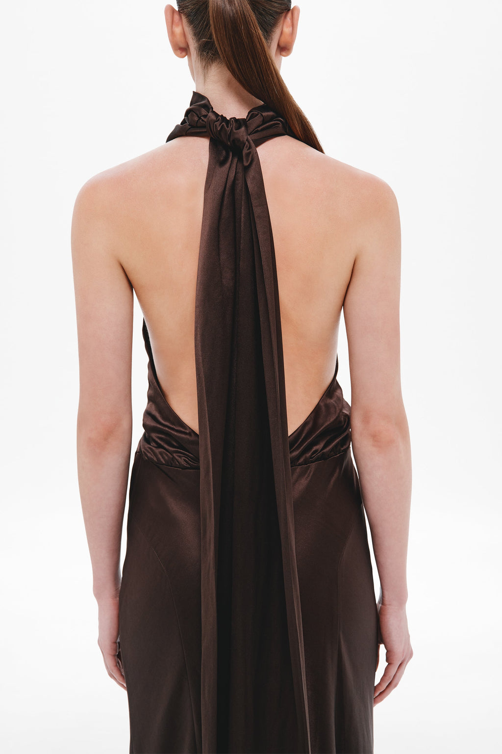 Chocolate satin open-back halter dress with long neck tie and gathered back
