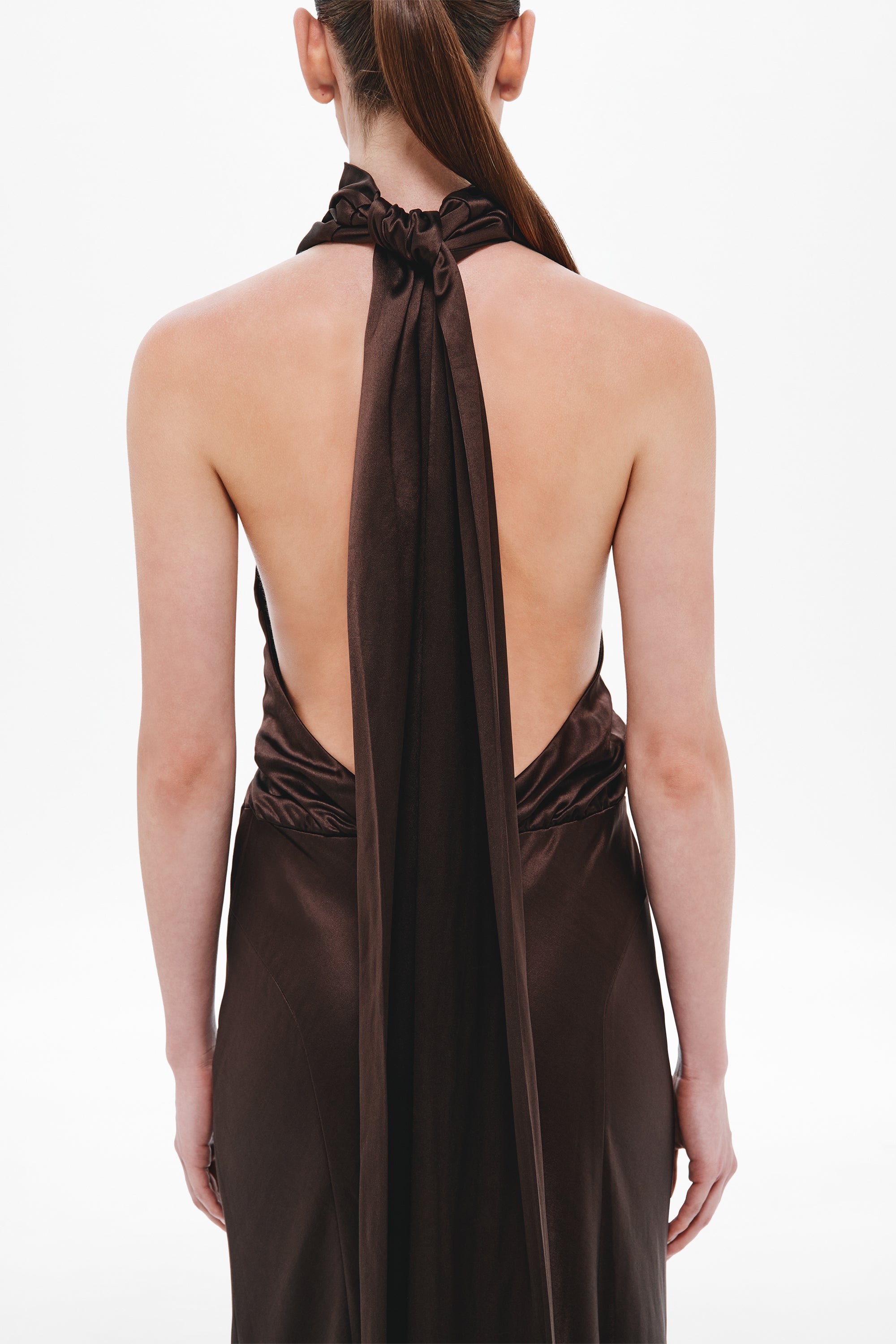 Chocolate satin open-back halter dress with long neck tie and gathered back