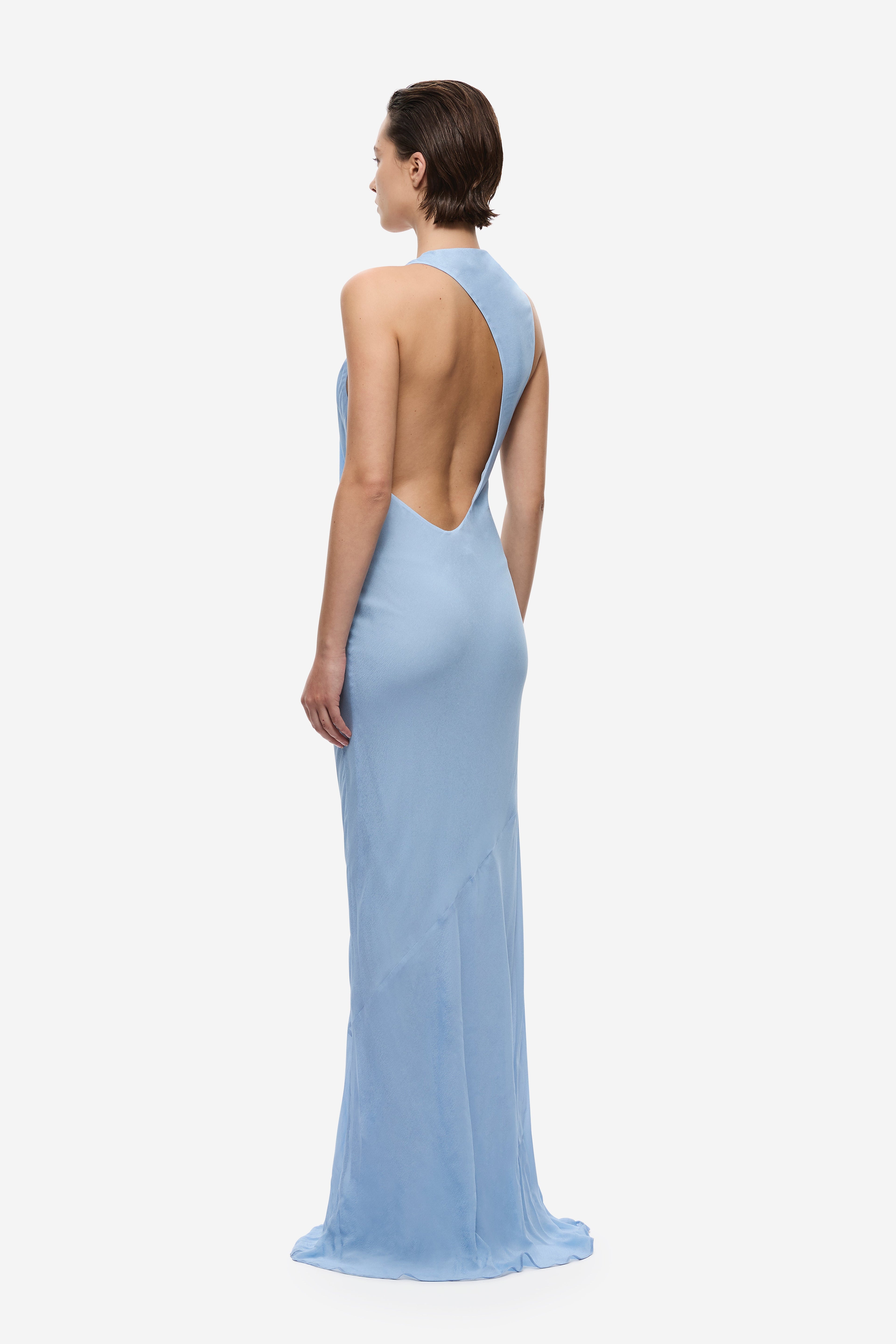 Cornflower blue backless halter draped maxi dress, side view