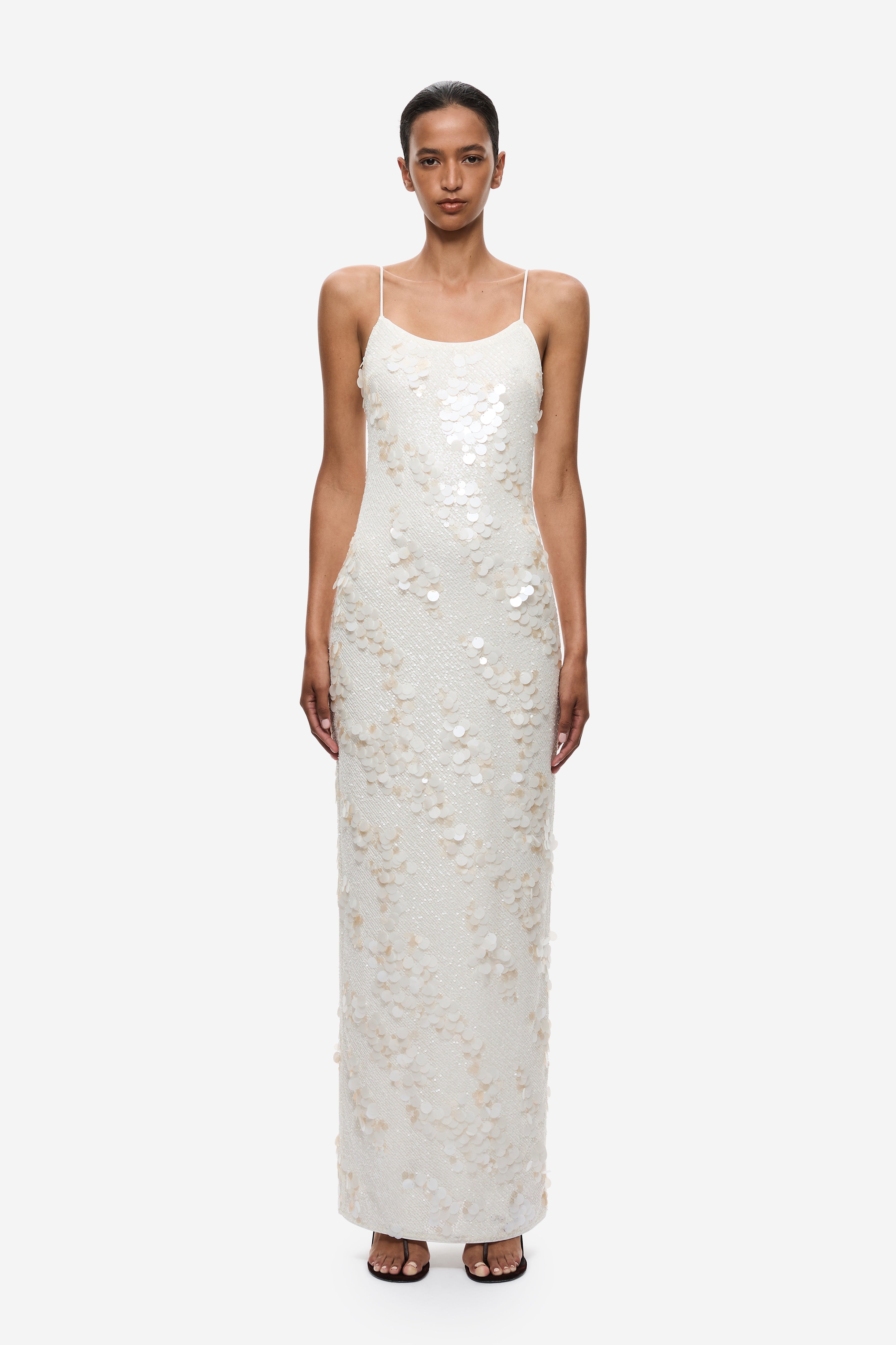 Ivory sequin maxi dress with spaghetti straps and scoop neckline