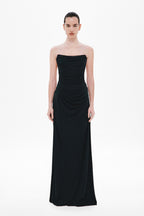 Black draped strapless maxi dress with ruched bodice and fitted waist