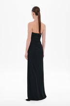 Black sleeveless maxi dress with draped back and thin cross-back straps